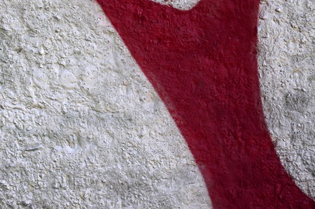 Street art. Abstract background image of a fragment of a colored graffiti painting in chrome and red tones.の写真素材