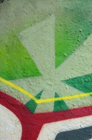 Street art. Abstract background image of a fragment of a colored graffiti painting in chrome and red tones.の写真素材