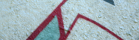 Street art. Abstract background image of a fragment of a colored graffiti painting in chrome and red tones.の写真素材