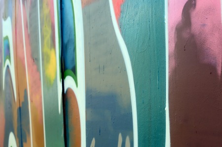 Street art. Abstract background image of a fragment of a colored graffiti painting in fashionable colors.の写真素材