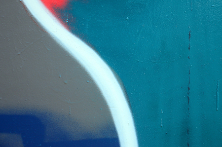 Street art. Abstract background image of a fragment of a colored graffiti painting in fashionable colors.の写真素材
