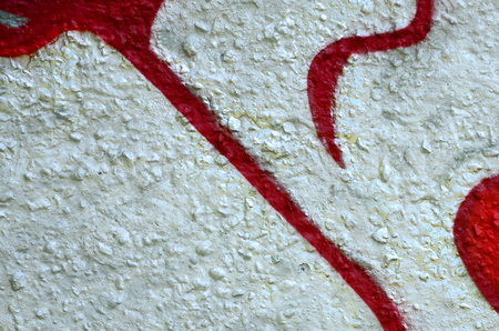 Street art. Abstract background image of a fragment of a colored graffiti painting in chrome and red tones.の写真素材