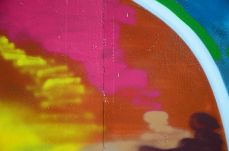 Street art. Abstract background image of a fragment of a colored graffiti painting in fashionable colors.の写真素材