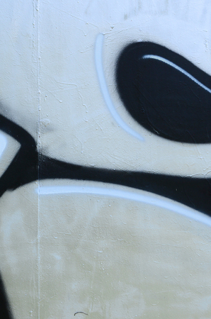 Street art. Abstract background image of a fragment of a colored graffiti painting in chrome and red tones.の写真素材