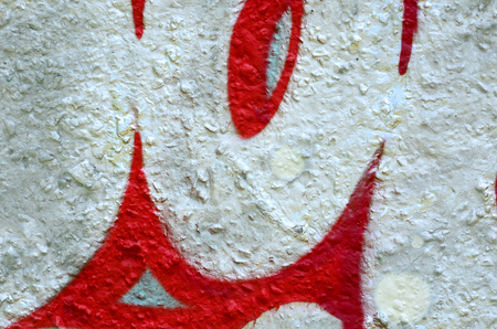 Street art. Abstract background image of a fragment of a colored graffiti painting in chrome and red tones.の写真素材