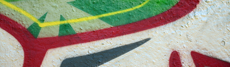 Street art. Abstract background image of a fragment of a colored graffiti painting in chrome and red tones.の写真素材