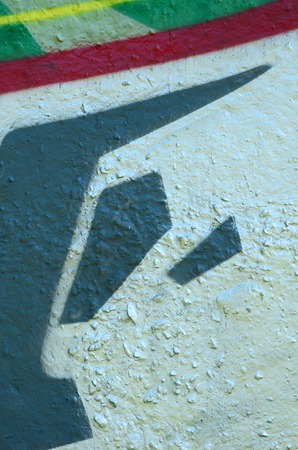 Street art. Abstract background image of a fragment of a colored graffiti painting in chrome and red tones.の写真素材