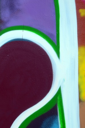 Street art. Abstract background image of a fragment of a colored graffiti painting in fashionable colors.の写真素材