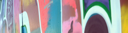Street art. Abstract background image of a fragment of a colored graffiti painting in fashionable colors.の写真素材