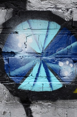 Street art. Abstract background image of a fragment of a colored graffiti painting in chrome and blue tones.の写真素材