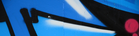 Street art. Abstract background image of a fragment of a colored graffiti painting in blue tones.の写真素材
