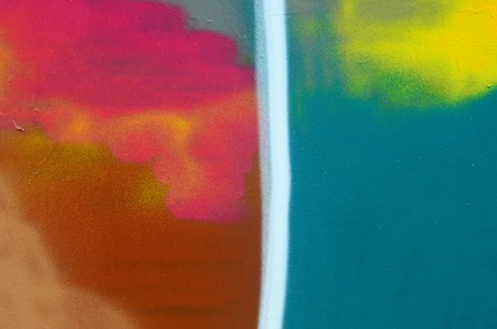 Street art. Abstract background image of a fragment of a colored graffiti painting in fashionable colors.の写真素材