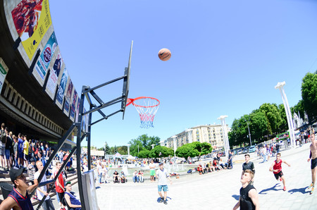 KHARKIV, UKRAINE - 27 MAY, 2018: Sports teams play streetball in the open air during the annual festival of street cultures.のeditorial素材