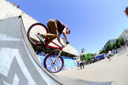 KHARKIV, UKRAINE - 27 MAY, 2018: Freestyle BMX riders in a skatepark during the annual festival of street cultures.のeditorial素材