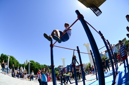 KHARKIV, UKRAINE - 27 MAY, 2018: Street workout show during the annual festival of street cultures.