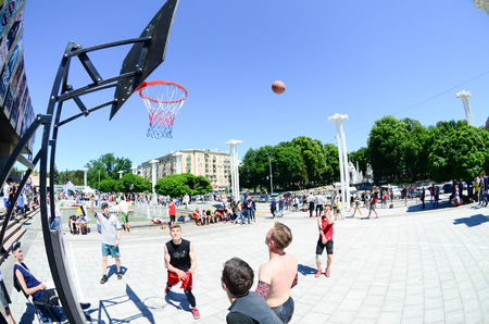 KHARKIV, UKRAINE - 27 MAY, 2018: Sports teams play streetball in the open air during the annual festival of street cultures.のeditorial素材