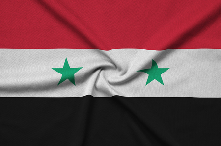 Syria flag  is depicted on a sports cloth fabric with many folds. Sport team waving bannerの写真素材