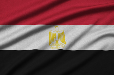 Egypt flag  is depicted on a sports cloth fabric with many folds. Sport team waving bannerの写真素材