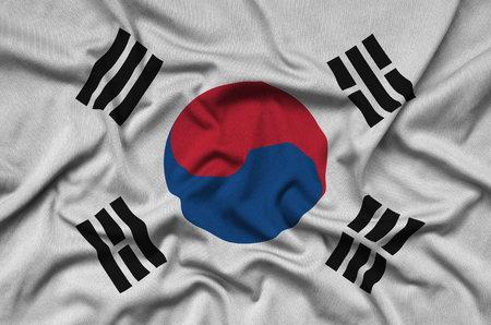 South Korea flag  is depicted on a sports cloth fabric with many folds. Sport team waving bannerの写真素材