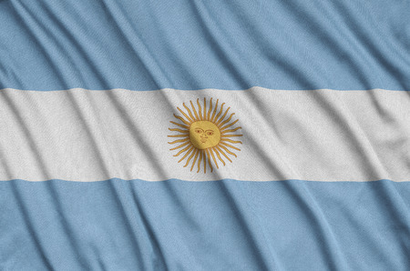 Argentina flag  is depicted on a sports cloth fabric with many folds. Sport team waving bannerの写真素材