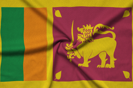Sri Lanka flag  is depicted on a sports cloth fabric with many folds. Sport team waving bannerの写真素材