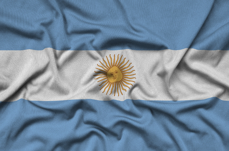 Argentina flag  is depicted on a sports cloth fabric with many folds. Sport team waving bannerの写真素材