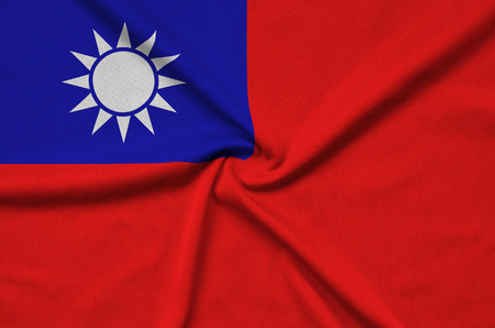 Taiwan flag  is depicted on a sports cloth fabric with many folds. Sport team waving bannerの写真素材