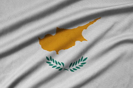 Cyprus flag  is depicted on a sports cloth fabric with many folds. Sport team waving bannerの写真素材