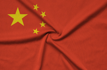 China flag  is depicted on a sports cloth fabric with many folds. Sport team waving bannerの写真素材