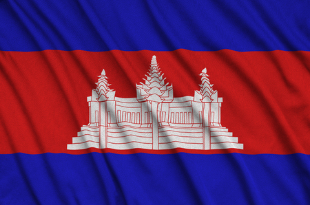 Cambodia flag  is depicted on a sports cloth fabric with many folds. Sport team waving bannerの写真素材