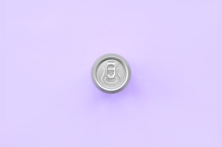 Metallic beer can on texture background of fashion pastel violet color paper in minimal concept.
