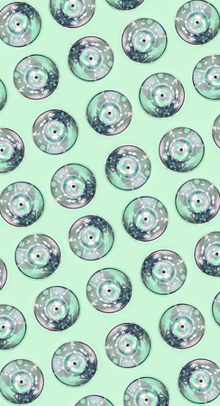 Many used spray cans for graffiti drawing lies on a pastel colored backgroung. Street art painting concept. Minimal flat lay pattern. Top view.の写真素材