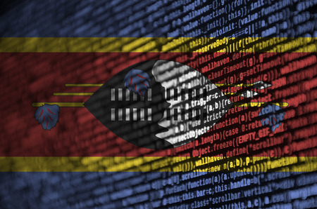 Swaziland flag  is depicted on the screen with the program code. The concept of modern technology and site development.の写真素材