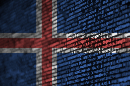 Iceland flag  is depicted on the screen with the program code. The concept of modern technology and site development.の写真素材
