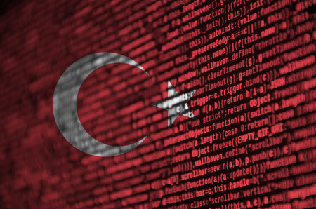 Turkey flag  is depicted on the screen with the program code. The concept of modern technology and site development.の写真素材