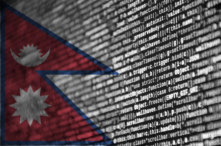 Nepal flag  is depicted on the screen with the program code. The concept of modern technology and site development.の写真素材