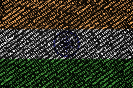 India flag  is depicted on the screen with the program code. The concept of modern technology and...