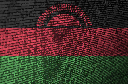 Malawi flag  is depicted on the screen with the program code. The concept of modern technology and site development.の写真素材