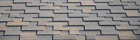 Modern roofing and decoration of chimneys. Flexible bitumen or slate shingles in rectangular shape...