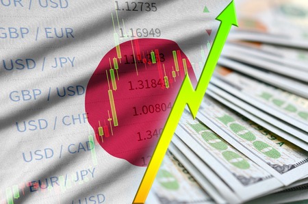 Japan flag and chart growing US dollar position with a fan of dollar bills. Concept of increasing value of US dollar currencyの写真素材