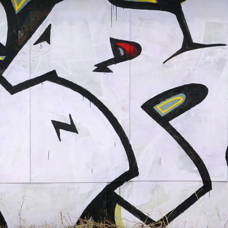 Fragment of colored street art graffiti paintings with contours and shading close up. Background texture of youth contemporary art culture. Black white and red colorsのeditorial素材