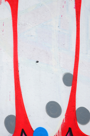 Fragment of colored street art graffiti paintings with contours and shading close up. Background texture of youth contemporary art culture. Pink red and black colorsの写真素材
