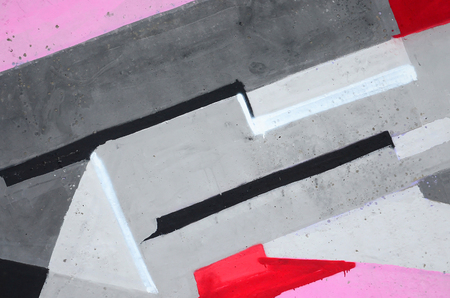 Fragment of colored street art graffiti paintings with contours and shading close up. Background texture of youth contemporary art culture. Pink red and black colorsのeditorial素材