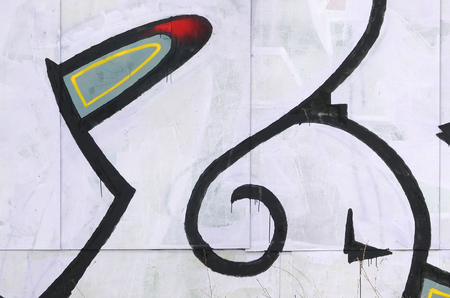 Fragment of colored street art graffiti paintings with contours and shading close up. Background texture of youth contemporary art culture. Black white and red colorsのeditorial素材
