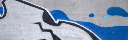 Fragment of colored street art graffiti paintings with contours and shading close up. Background texture of youth contemporary art culture. Blue and chrome colorsのeditorial素材