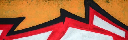 Fragment of colored street art graffiti paintings with contours and shading close up. Background...