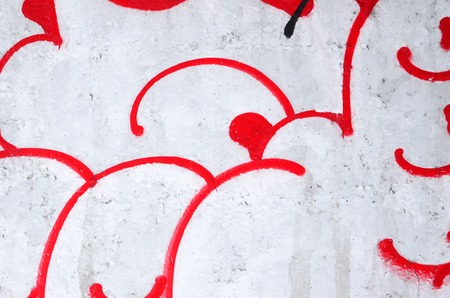 Fragment of colored street art graffiti paintings with contours and shading close up. Background texture of youth contemporary art culture. Pink red and black colorsのeditorial素材