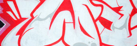 Fragment of colored street art graffiti paintings with contours and shading close up. Background texture of youth contemporary art culture. Pink red and black colorsのeditorial素材