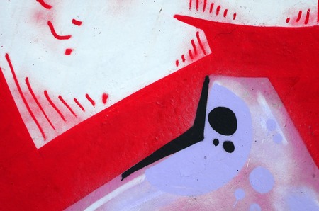 Fragment of colored street art graffiti paintings with contours and shading close up. Background texture of youth contemporary art culture. Pink red and black colorsの写真素材