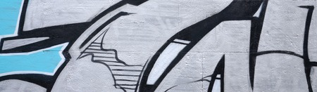 Fragment of colored street art graffiti paintings with contours and shading close up. Background...